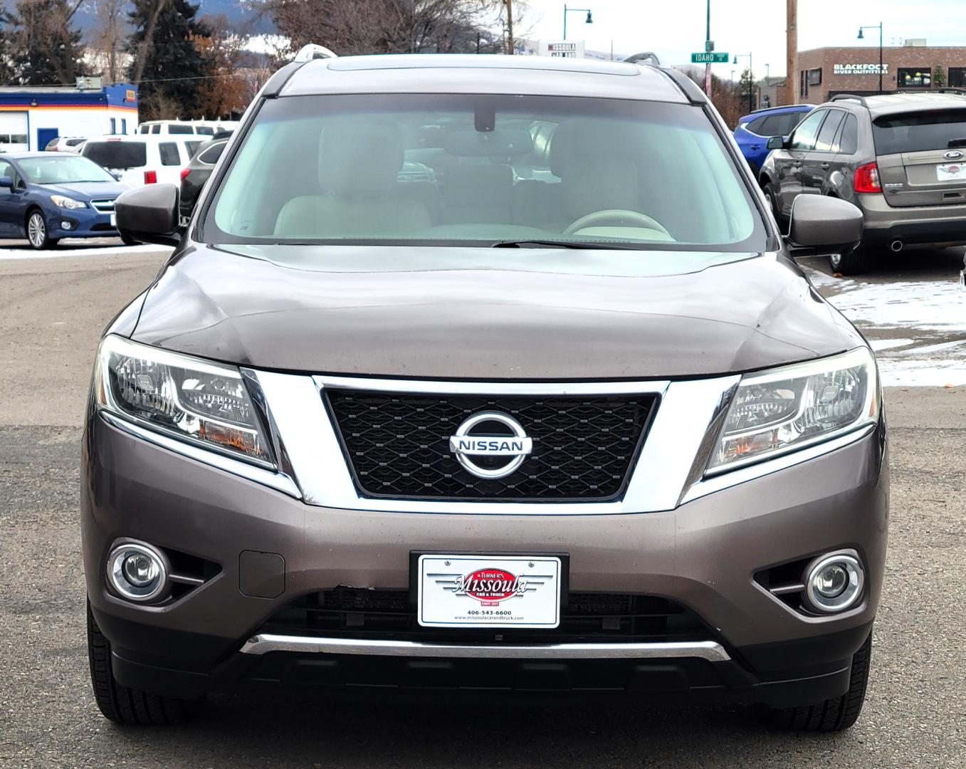 2013 Brown /Tan Nissan Pathfinder Platinum (5N1AR2MM1DC) with an 3.5L V6 engine, Automatic / CVT transmission, located at 450 N Russell, Missoula, MT, 59801, (406) 543-6600, 46.874496, -114.017433 - 4 Wheel Drive SUV. Power Sunroof. 3rd Row Seating. Heated Leather Front and Middle Seats. Power Front Seats. DVD Screens in Headrests. Navigation. Bluetooth. Backup Camera. AM FM CD DVD XM. Heated Steering Wheel. Towing. - Photo#2